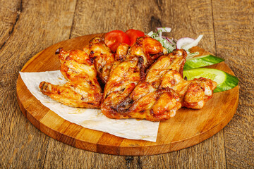 Chicken wings barbeque vith vegetables