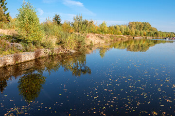 View of the water channel on an autumn sunny day
