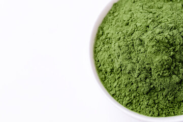 Detox Superfood Green Barley Sprout grass powder . Space for Text on white background isolated