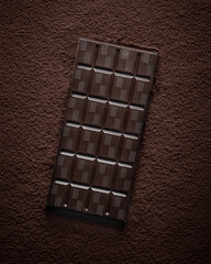 Chocolate bar on the chocolate powder. 