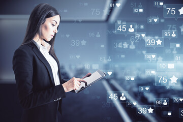 Social networking and rating concept with businesswoman with digital tablet and virtual social media application icon