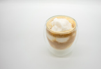 Coconut blend coffee in double wall glass isolated on white