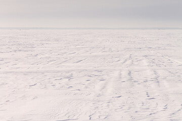 natural background winter minimalism, snow field turning into the sky