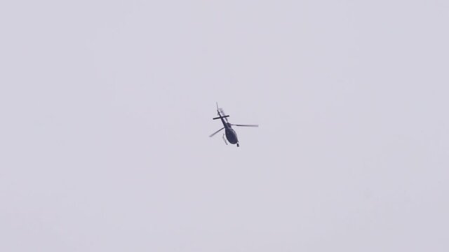 Helicopter from the police with a huge camera attached to it