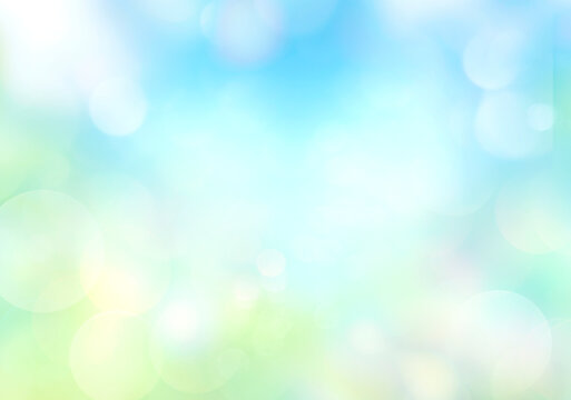 Blue green blurred abstract background,natural bokeh.Soft colorful backdrop.Spring defocused wallpaper.