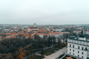 Aerial shot of the main square with the Palace of the Grand Dukes of Lithuania in Vilnius, Lithuania during gloomy winter day