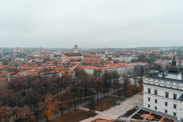 Fototapeta na wymiar Aerial shot of the main square with the Palace of the Grand Dukes of Lithuania in Vilnius, Lithuania during gloomy winter day