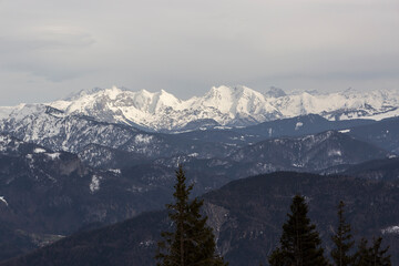Fototapeta na wymiar Panoramic mountain view from Kampenwand, Bavaria, Germany in wintertime