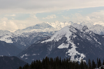 Fototapeta na wymiar Panoramic mountain view from Kampenwand, Bavaria, Germany in wintertime
