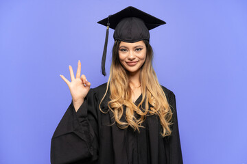 Young university graduate Russian girl isolated on white background showing ok sign with fingers