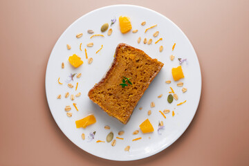 Vegan whole grain orange sponge cake with sugar glaze