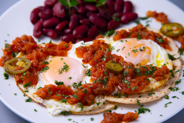 Huevos rancheros with red beans
