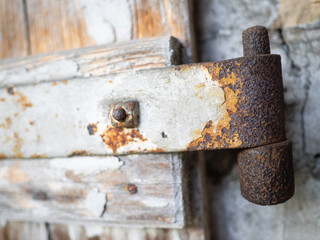 old rusty hinge on door