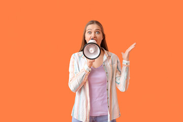 Stressed young woman with megaphone on color background