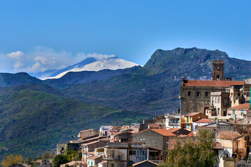 Fototapeta na wymiar view and pamorama of the characteristic village in Sicily province of messina between mountains and sea, Casalvecchio Siculo, Me