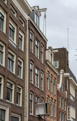Typical way of moving house in Amsterdam, using pulley with a rope