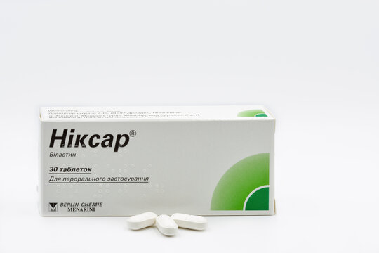 Nixar bilastin tablets by Berlin Chemie Menarini closeup against white.