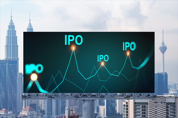 IPO icon hologram on road billboard over day time panorama city view of Kuala Lumpur. KL is the hub...