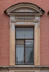 Windows in the city in the old style, with stucco, decorative elements
