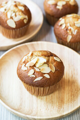 Close up of banana muffin almond in a wooden plate, an optional vegan dessert for a healthy diet and low carb