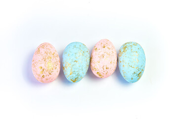 Painted Easter eggs light background.