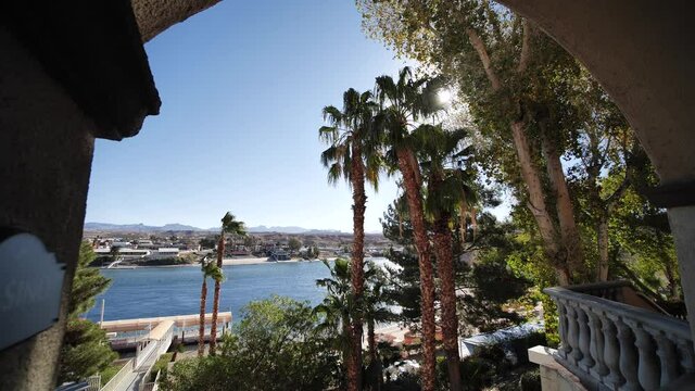 Luxury beachfront on Colorado river in Laughlin, Nevada, USA. Revealing terrace view from hotel casino resort