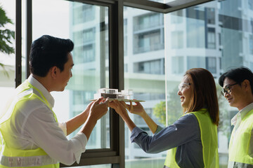 Heads of each department meeting together between Engineers or Architect for modern box house. Brainstorm management an idea to find a way to deal with construction and communication for design.