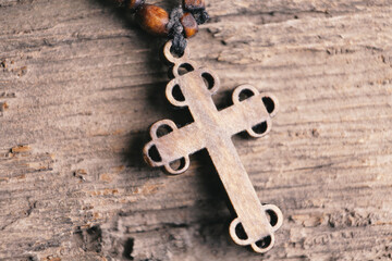 wood cross on wood table
