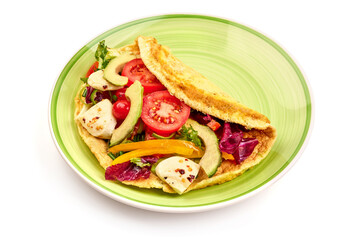 Omelette with avocado, tomatoes and mozzarella cheese, isolated on white background. Healthy breakfast. High resolution image