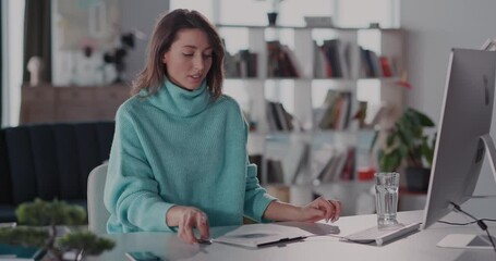 Young caucasian woman creative designer using graphic tablet notepad drawing with pencil on digital screen surface performing art making project. - Powered by Adobe