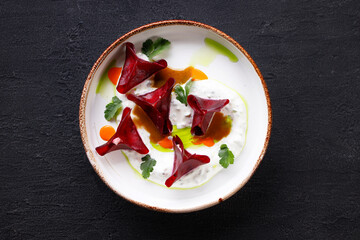 Beetroot ravioli stuffed with spinach and ricotta