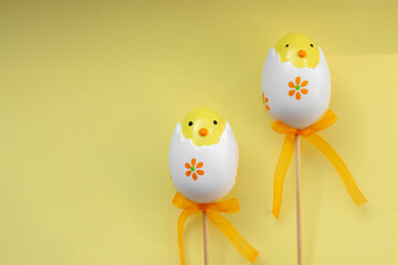 Easter eggs on yellow pastel background happy spring vibe celebrate holiday
