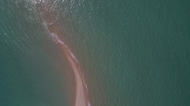 4k ovehead clip over a peninsula on  the tropical beach of Epanomi, Halkidiki, Greece