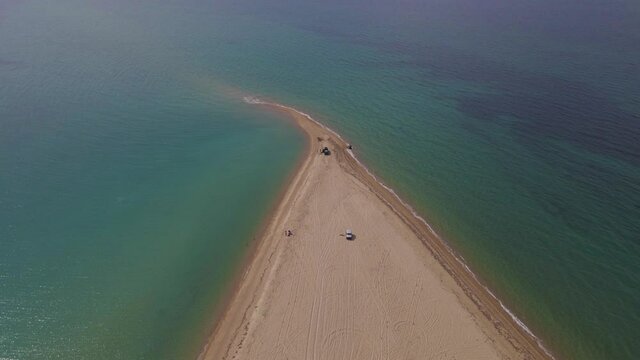 4k forward moving clip over a peninsula on  the tropical beach of Epanomi, Halkidiki, Greece