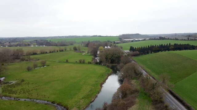A lowering drone shot along the Stour river in chartham village