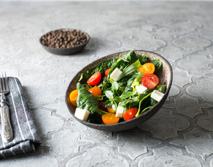 salad with spinach tomatoes and cheese