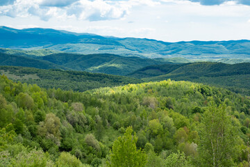 Obraz premium Hills panorama of transcarpathia. Countryside view at wonderful springtime. Mountain landscape.