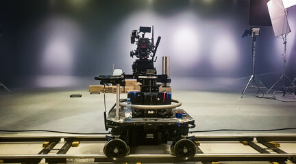 Camera on a dolly track in a film studio