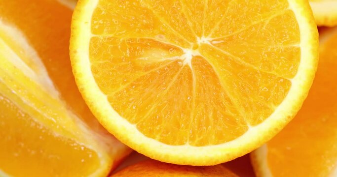 oranges slices rotate. Fresh citrus orange fruit close up. Super slow motion