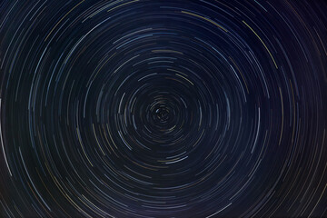 Star trails rotation of bright stars at night around the Polar Star - 423808527