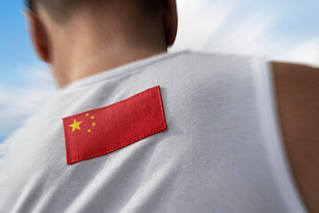 The national flag of China on the athlete's back