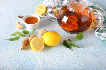 Tea, lemon, honey and ginger healthy on the light background