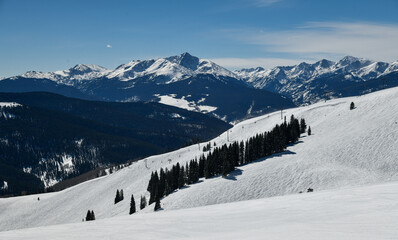 Fototapeta na wymiar Freeriding zone at off-piste ski slope or at a groomed slope at Vail Ski resort, CO.