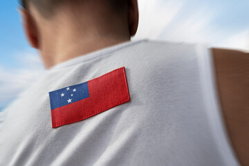 The national flag of Samoa on the athlete's back