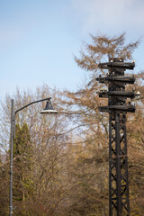 Obsolete electricity poles on a sunny day