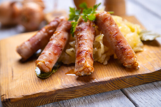 Grilled german sausage links with sauerkraut