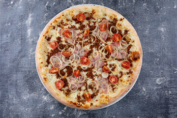 pizza on the wooden background