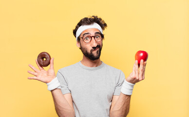 young crazy bearded athlete doubting or uncertain expression