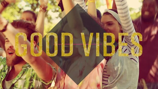 Animation of good vibes text over diamond shape and people dancing at party in background