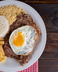 Refeição - Prato Feito - Bife à cavalo, arroz, farofa e batata frita